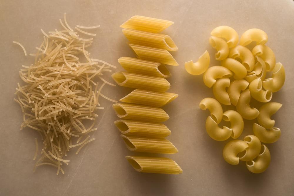 A variety of Italian dishes including pasta and pizza
