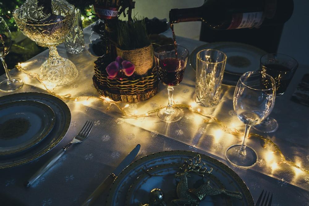 A beautifully set dining table with festive holiday decorations